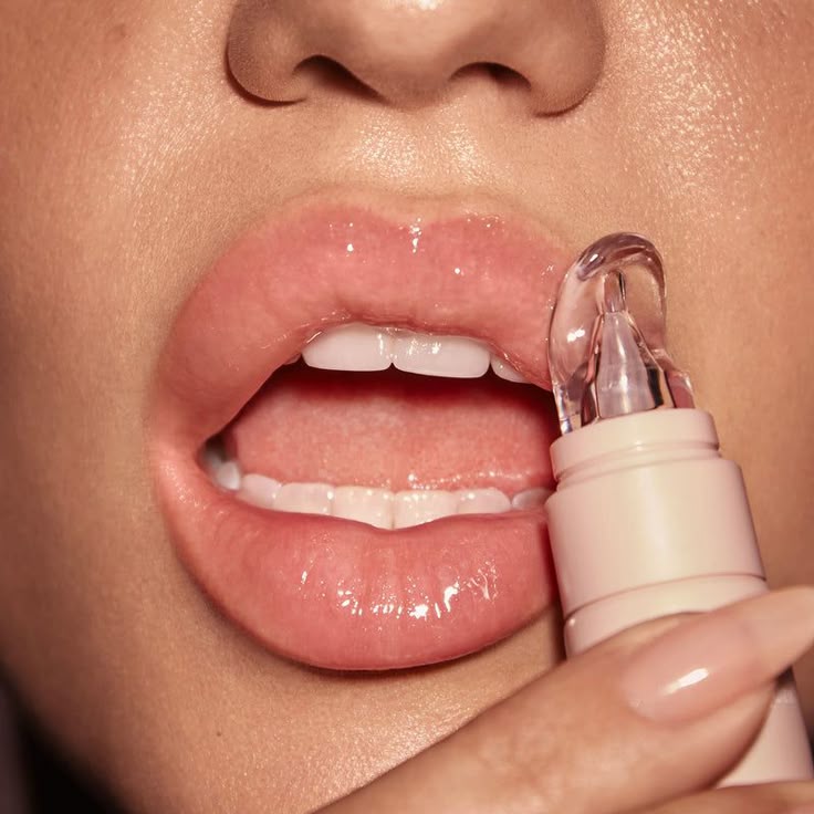 girl applying product to solve chapped lips issue.