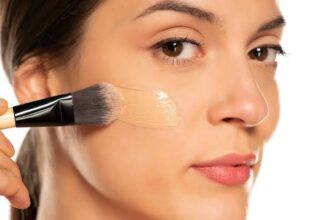 Women applying foundation in proper way to get rid of oxidation.