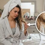 Girl holding her damaged hairs which are irreparable.