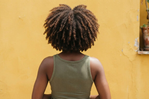 Close-up of defined, healthy coily hair.